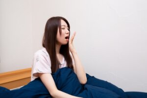 寝起きにだるさを感じるママ