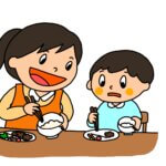 お箸の持ち方を教えるママ