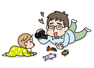 育児記録を付けるパパ